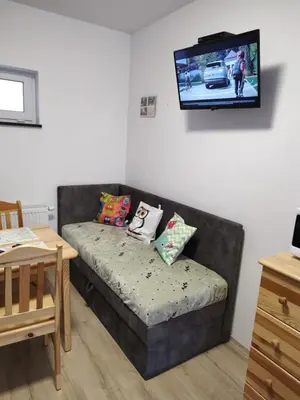 Telewizja i/lub zestaw kina domowego w obiekcie Pokoje Pod Gruszą -osobne wejścia