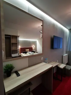 Telewizja i/lub zestaw kina domowego w obiekcie Noclegi Pod Borem