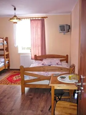 Łóżko lub łóżka w pokoju w obiekcie Villa Panorama