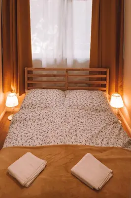 Łóżko lub łóżka w pokoju w obiekcie Apartament 3