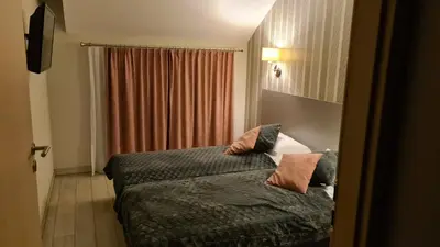 Łóżko lub łóżka w pokoju w obiekcie Apartament Czarna Góra S26