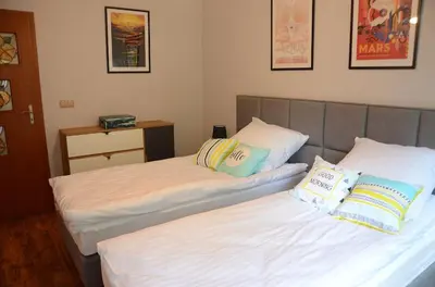 Łóżko lub łóżka w pokoju w obiekcie Apartament Fabryka Endorfin Kłodzko