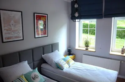 Łóżko lub łóżka w pokoju w obiekcie Apartament Fabryka Endorfin Kłodzko