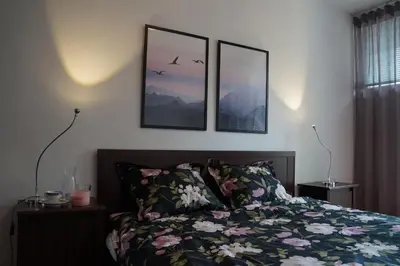 Łóżko lub łóżka w pokoju w obiekcie Apartament Gliwice Centrum Dunikowskiego z garażem
