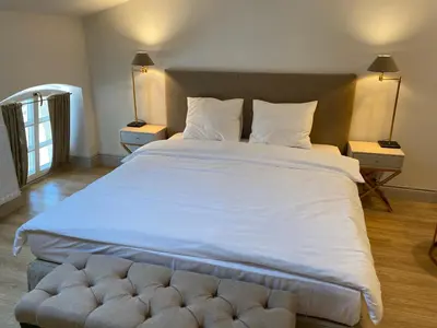 Łóżko lub łóżka w pokoju w obiekcie Zamek Sarny - Schloss Scharfeneck