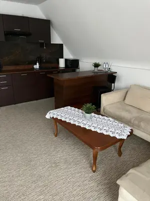 Część wypoczynkowa w obiekcie Apartament i pokoje Szalawa