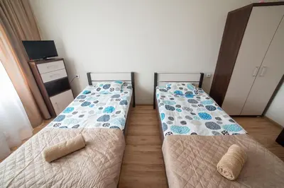 Łóżko lub łóżka w pokoju w obiekcie Strzelec Noclegi