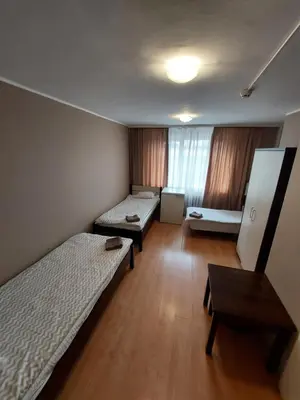 Łóżko lub łóżka w pokoju w obiekcie Strzelec Noclegi