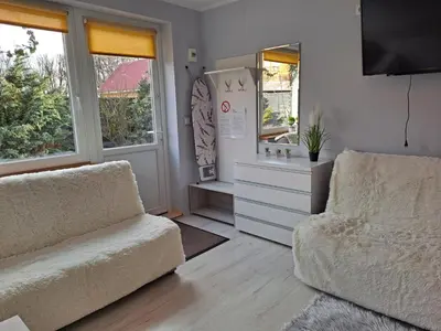Telewizja i/lub zestaw kina domowego w obiekcie Pokoje Gościnne Biura Turystycznego KRIS