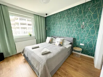 Łóżko lub łóżka w pokoju w obiekcie Star4You II Apartments