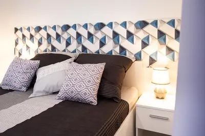 Łóżko lub łóżka w pokoju w obiekcie Apartamenty Pod Cisem
