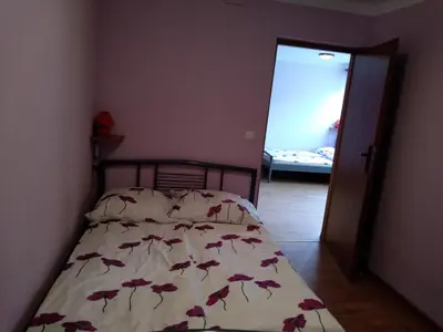 Łóżko lub łóżka w pokoju w obiekcie Na Skwerku