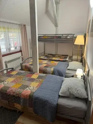 Łóżko lub łóżka w pokoju w obiekcie ZACISZE