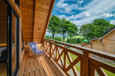 Balkon lub taras w obiekcie Domki Osada Zieleniec