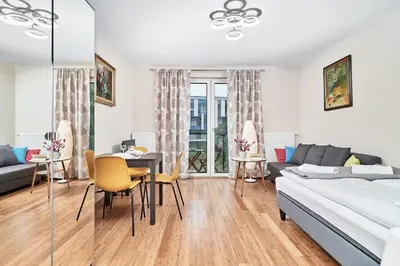 Łóżko lub łóżka w pokoju w obiekcie Exclusive Apartments Marina by Noclegi Renters