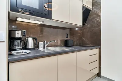 Kuchnia lub aneks kuchenny w obiekcie Exclusive Apartments Marina by Noclegi Renters