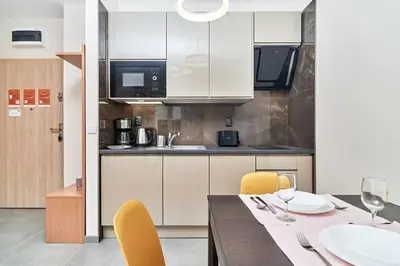 Kuchnia lub aneks kuchenny w obiekcie Exclusive Apartments Marina by Noclegi Renters