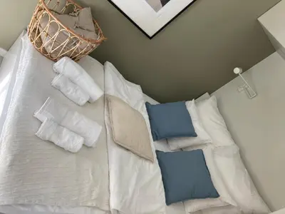 Łóżko lub łóżka w pokoju w obiekcie APARTAMENT Marina Port