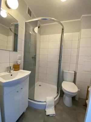Łazienka w obiekcie APARTAMENT OŚ. ZŁOTE 4B