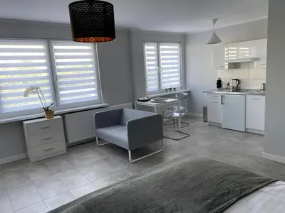 Kuchnia lub aneks kuchenny w obiekcie APARTAMENT OŚ. ZŁOTE 4B