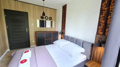 Łóżko lub łóżka w pokoju w obiekcie Lux Apartment Loft