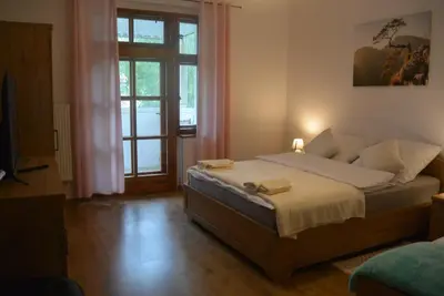 Łóżko lub łóżka w pokoju w obiekcie SONIA