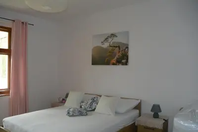 Łóżko lub łóżka w pokoju w obiekcie SONIA