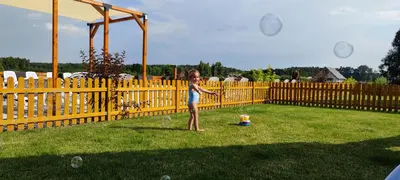 Plac zabaw dla dzieci w obiekcie MIODOWA SADYBA Domki całoroczne Kluczbork