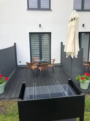 Patio lub wspólna przestrzeń na świeżym powietrzu w obiekcie Ptasia Osada Joachimówka