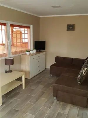 Telewizja i/lub zestaw kina domowego w obiekcie Domek MajAmi