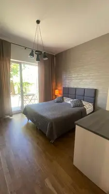 Łóżko lub łóżka w pokoju w obiekcie Marina apartament