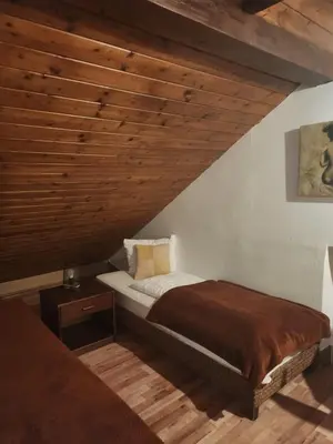 Łóżko lub łóżka w pokoju w obiekcie HOTELIK Hacjenda