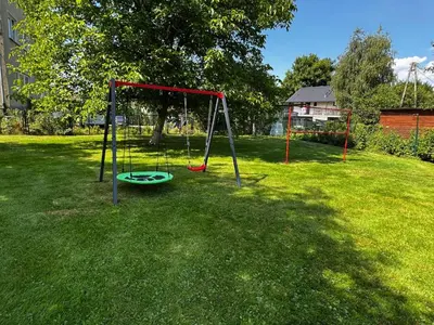 Plac zabaw dla dzieci w obiekcie Pokoje gościnne Helena