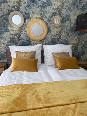Łóżko lub łóżka w pokoju w obiekcie Apartament BellaPola Loft
