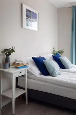 Łóżko lub łóżka w pokoju w obiekcie Apartamenty-Kudowa z pięknym widokiem i balkonem