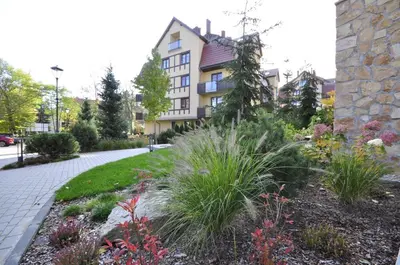 Ogród w obiekcie Apartament harmonic aparts