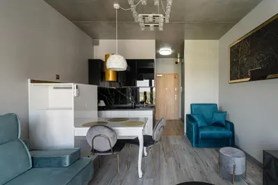 Kuchnia lub aneks kuchenny w obiekcie RentPlanet - Apartamenty Zarembowicza
