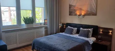 Łóżko lub łóżka w pokoju w obiekcie Mieszkanie Jednopokojowe, ul Dworcowa, Centrum, Parking Gratis!!!