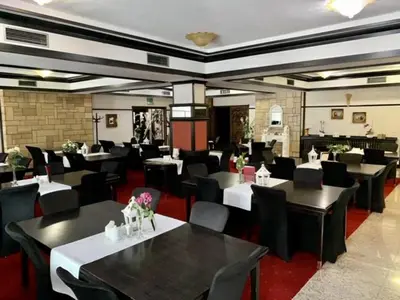Restauracja lub miejsce do jedzenia w obiekcie Nocowanie Restauracja Wenecka