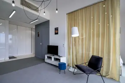 Telewizja i/lub zestaw kina domowego w obiekcie RentPlanet - Apartament Sky Tower