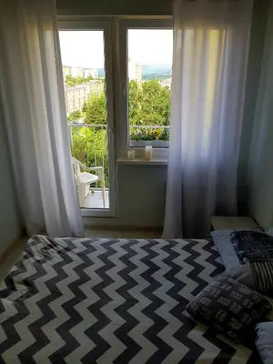 Łóżko lub łóżka w pokoju w obiekcie Apartament WAGABUNDA