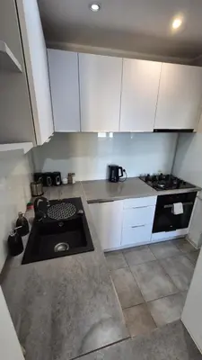 Kuchnia lub aneks kuchenny w obiekcie Apartament WAGABUNDA