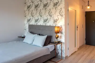 Łóżko lub łóżka w pokoju w obiekcie apartamenty-wroc Bulwary Książęce