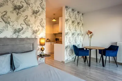 Łóżko lub łóżka w pokoju w obiekcie apartamenty-wroc Bulwary Książęce