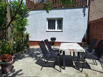 Patio lub wspólna przestrzeń na świeżym powietrzu w obiekcie Noclegi Różanka