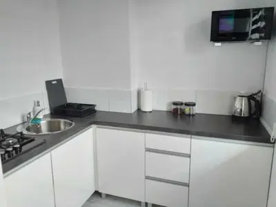 Kuchnia lub aneks kuchenny w obiekcie Apartamencik na Doby - Lubin