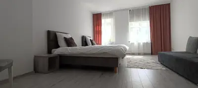Łóżko lub łóżka w pokoju w obiekcie CITY VIEW Saperów II - klimatyzacja, przy parku