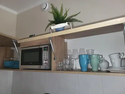 Kuchnia lub aneks kuchenny w obiekcie Apartamenty Willove Wzgórze