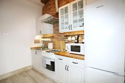 Kuchnia lub aneks kuchenny w obiekcie Apartament Gwarek