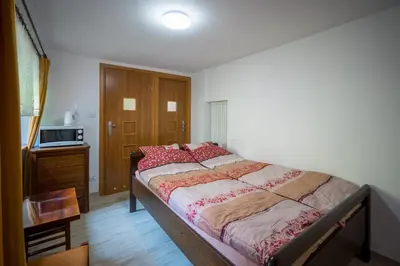 Łóżko lub łóżka w pokoju w obiekcie Daglezja